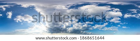 Seamless panorama of sky with puffy Cumulus clouds in spherical equirectangular format with complete zenith for use in 3D graphics, game and composites in aerial drone 360 degree panoramas as sky dome
