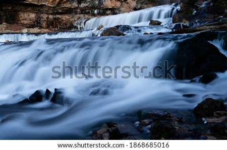 a waterfall taken with long exposure.