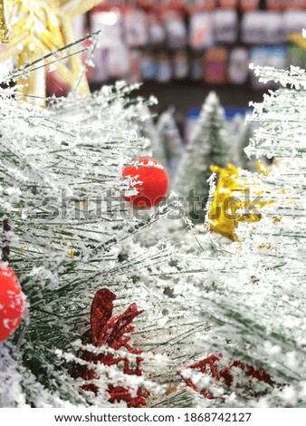 Selective focus picture with noise effect of christmas tree decoration.