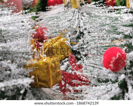 Selective focus picture with noise effect of christmas tree decoration.