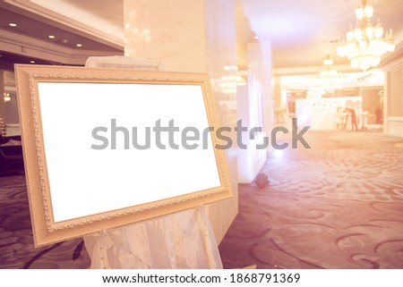 Blank Golden vintage photo frame at entrance wedding hall.
Blank photo frame with copy space at hotel
Blank advertising billboard.
Poster media template Ads display with copy space,