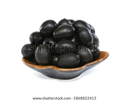 pickled olives in plate isolated on white background