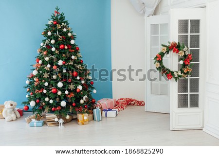 Winter Christmas Tree with gift decoration for the new year