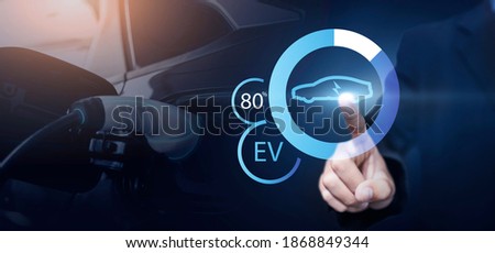 EV hybrid car electric vehicle hologram charging electric charge station powered connected power supply of alternative sustainable eco energy, modern futuristic technology graphics control navigation