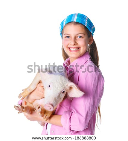 Little farmer. Cute girl with pig. Isolated on white background.