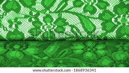 Green lace. This stunning and sophisticated fabric will be a true work of art. Intense green with delicate lace patterns that we love so much; unique, elegant and vibrant.