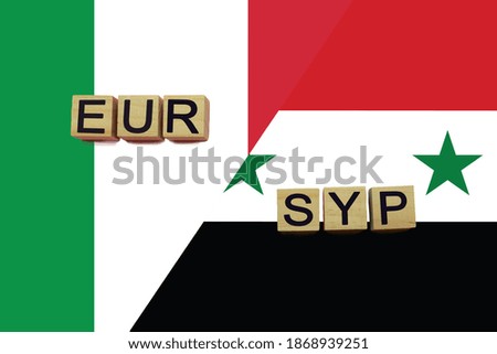 Italy and Syria currencies codes on national flags background. International money transfer concept
