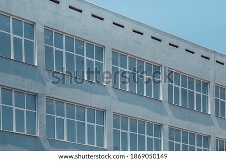 Gray modern building in perspective
