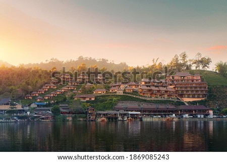 Ban Rak Thai Village is a Chinese settlement with lake during sunset in Mae Hong Son province near Chiangmai, Thailand. Royalty-Free Stock Photo #1869085243