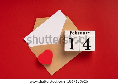 Red Valentine's day background with copy space. A envelope with hearts flying out of it
