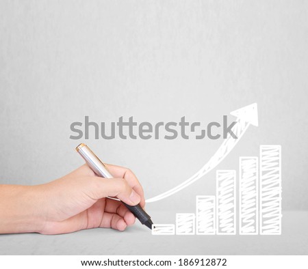 hand man drawing a graph 