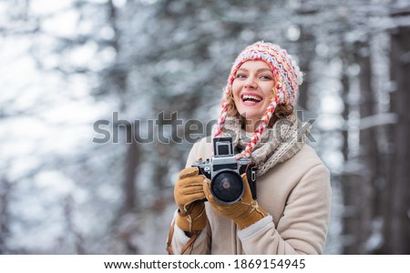 Woman photographer. Inspiration create something special. Spend day outdoors. Girl with vintage camera in snowy nature. Traveling concept. Capturing winter. Take stunning winter photos. Winter hobby.