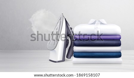 Stack of neatly folded clean clothes and iron with water vapor realistic vector illustration Royalty-Free Stock Photo #1869158107