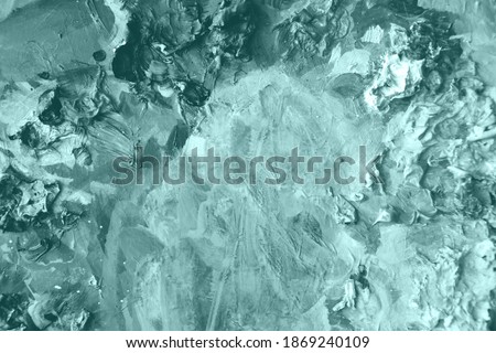 Tidewater green color brushstrokes in oil on canvas. Abstract Tidewater green colour acrylic painted background. Colour of the year 2021. Oil paint natural surface background. Royalty-Free Stock Photo #1869240109