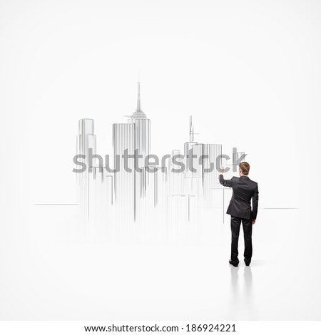 Businessman draws city