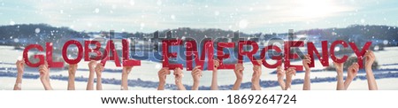 People Hands Holding Word Global Emergency, Snowy Winter Background