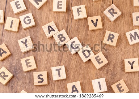 Wooden alphabet write; a, b, c, d, e Royalty-Free Stock Photo #1869285469