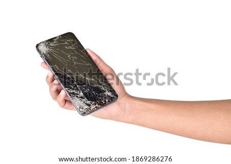 broken display smartphone in hand isolated on white background with clipping path