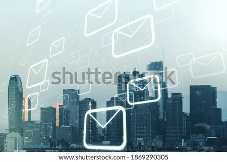 Abstract virtual postal envelopes hologram on Los Angeles cityscape background, email and notification concept. Multiexposure