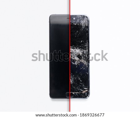 Mobile smartphone with broken screen on white background. Repairs concept.