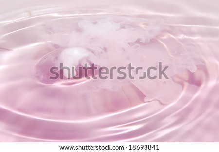 The milk mixed with tinted pink water