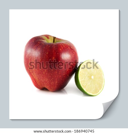 Isolated red apple with sliced lime on a white background. Fresh diet fruit. Healthy fruit with vitamins.
