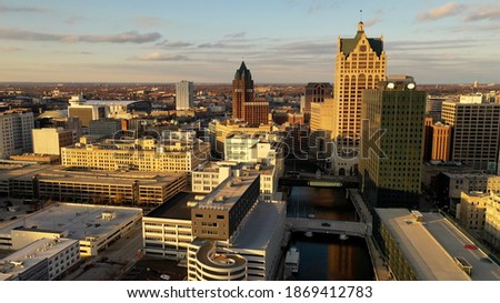 Aerial view of American city at sunset. Milwaukee skyline, Wisconsin