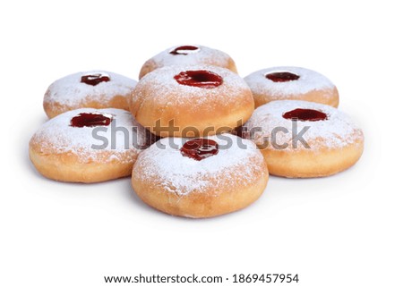 Hanukkah doughnuts with jelly and sugar powder on white background