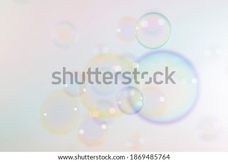 Blur colorful soap bubbles float background.