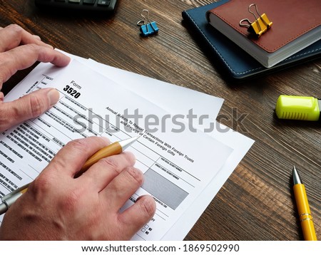 Conceptual photo about Form 3520 Annual Return To Report Transactions With Foreign Trusts and Receipt of Certain Foreign Gifts with written phrase. Royalty-Free Stock Photo #1869502990