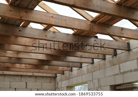 Ceiling construction concept. Photo of the floor in an unfinished house.