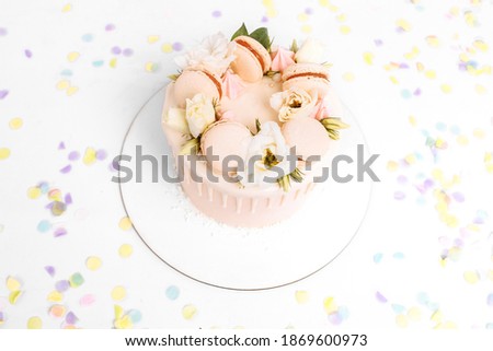 beautiful cake decorated with flowers, birthday and wedding cake, on isolated white background