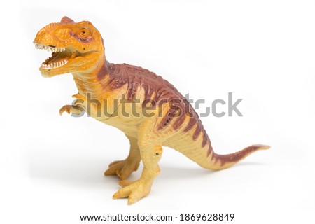 Tyrannosaurus plastic toy in white background