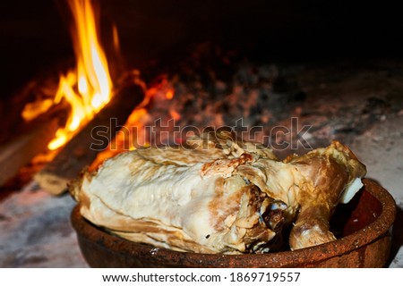 lamb roasted in a traditional wood-fired oven