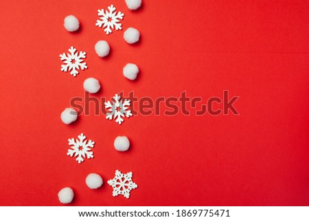 Christmas greeting card with line of snowflakes on red backgroun. Xmas holiday postcard with place for your text. Happy New Year