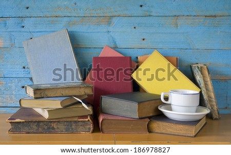 old books with a cup of coffee, free copy space