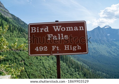 Bird Woman Falls waterfall sign in Glacier National Park