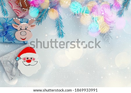Toy Santa Claus and elk moose on gift boxes. Animation for a happy New year greeting card. Christmas card. Background for the text