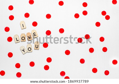 Valentines day lettering text with wooden letters on white background. Greeting card, banner
