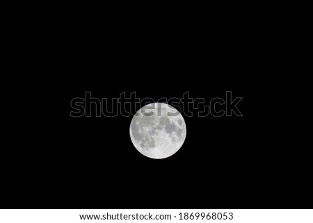 Full Moon in a dark sky at night