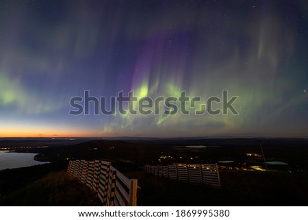 Aurora Borealis - Amazing color effect on the sky. Image taken during night, colorful miracle in the dark sky.
