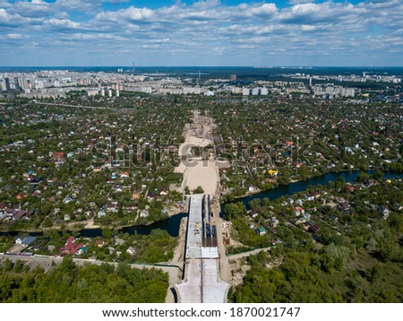 Aerial drone view. Unfinished bridge in Kiev, sunny summer day.