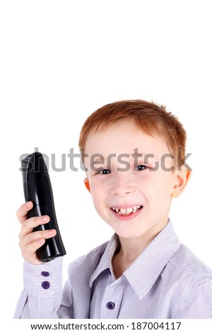 handsome young smiling boy with the phone