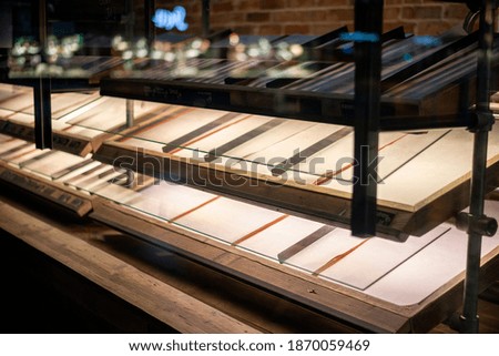 Empty display shelfs in a cafe or bakery shop. Royalty-Free Stock Photo #1870059469