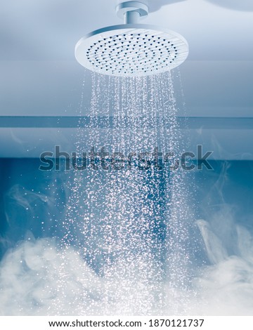 contrast shower with flowing water stream and steam Royalty-Free Stock Photo #1870121737
