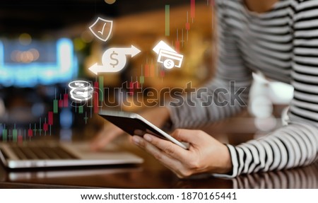 Businesspeople using a smartphone, transfer money, pay for goods and services with a secure protection system. Mobile banking network. Royalty-Free Stock Photo #1870165441