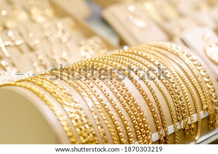 Jewelry Gold Chain for sale in the jewelry store. Royalty-Free Stock Photo #1870303219