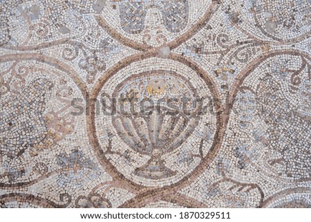 Fragment of Mosaic floor of a Byzantine church. Khirbet Beit Lei or Beth Loya at Judean lowlands. Israel Royalty-Free Stock Photo #1870329511
