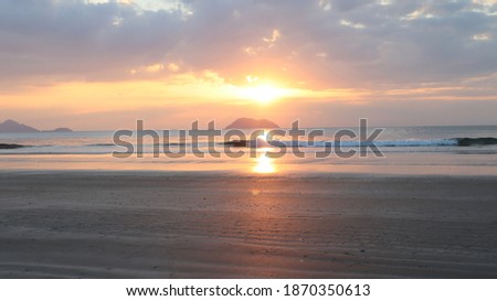 The sun is setting at Laem Son Beach, Ranong Province. Which is in the south of Thailand It is in Southeast Asia. This photo was taken in December.
