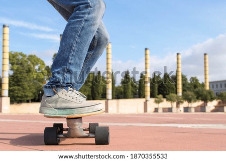 Skater with Longboard in the park